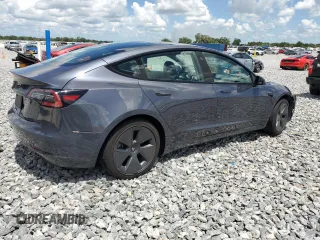 2023 Tesla Model 3 с VIN 5YJ3E1EA4PF449103, выставлен на аукционе Copart как лот 61309645 с пробегом 131 784 миль миль и Чистый • Clean title. История ставок и продаж доступна на DreamBid. Изображение 3.