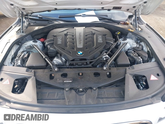 2015 BMW 7 Series 750Li xDrive with VIN WBAYF8C56FD654765, listed as a IAAI auction lot 40734550 with 133,848 mi miles and . Bid and sale history available at carsss.com. Image 10.