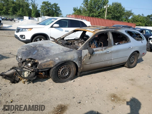 2002 Mercury Sable z VIN 1MEFM58U12G624563, wystawiony jako Copart lot #68440994 z przebiegiem Nie podano mil oraz Nie do naprawy • Non repairable. Historia ofert i sprzedaży dostępna na DreamBid. Obrazek 1.