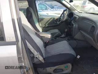 2003 Chevrolet TrailBlazer LTZ with VIN 1GNDT13S032236031, listed as a IAAI auction lot 41695412 with 136,750 mi miles and . Bid and sale history available at DreamBid. Image 5.