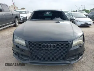 2013 Audi A7 Prestige z VIN WAU2GAFCXDN054133, wystawiony jako IAAI lot #41924265 z przebiegiem 170 498 mil mil oraz . Historia ofert i sprzedaży dostępna na DreamBid. Obrazek 13.