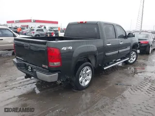 2013 GMC Sierra 1500 SLT with VIN 3GTP2WE70DG205210, listed as a IAAI auction lot 41107618 with 166,354 mi miles. Bid and sale history available at carsss.com. Image 4.