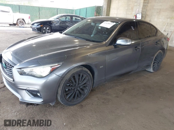 2019 Infiniti Q50 Luxe z VIN JN1EV7AR8KM594171, wystawiony jako IAAI lot #42428037 z przebiegiem 70 086 mil mil oraz . Historia ofert i sprzedaży dostępna na DreamBid. Obrazek 17.