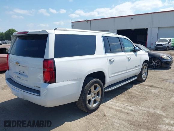 2020 Chevrolet Suburban Premier with VIN 1GNSCJKC9LR125292, listed as a IAAI auction lot 42073858 with 92,363 mi miles and . Bid and sale history available at DreamBid. Image 4.