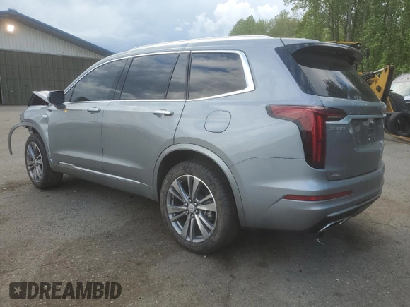 2025 Cadillac XT6 AWD Premium Luxury z VIN 1GYKPDRS8SZ118323, wystawiony jako Copart lot #56156145 z przebiegiem 12 406 mil mil oraz Tytuł czysty. Historia ofert i sprzedaży dostępna na DreamBid. Obrazek 2.
