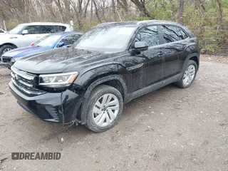 2023 Volkswagen Atlas SE z VIN 1V2HE2CA1PC210232, wystawiony jako IAAI lot #40966039 z przebiegiem 4 064 mil mil oraz . Historia ofert i sprzedaży dostępna na DreamBid. Obrazek 2.