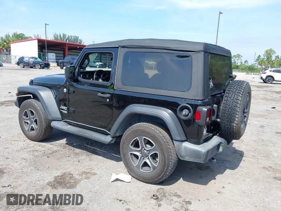 2019 Jeep Wrangler Sport S with VIN 1C4GJXAG2KW664395, listed as a IAAI auction lot 42683888 with 72,742 mi miles and . Bid and sale history available at DreamBid. Image 3.