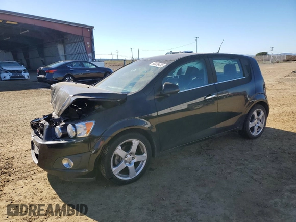 2012 Chevrolet Sonic LTZ z VIN 1G1JE6SH5C4195594, wystawiony jako Copart lot #88336435 z przebiegiem 105 112 mil mil oraz Szkoda całkowita • Salvage title. Historia ofert i sprzedaży dostępna na DreamBid. Obrazek 1.