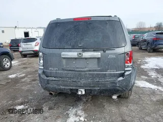 2013 Honda Pilot EX-L with VIN 5FNYF4H65DB001749, listed as a IAAI auction lot 41426636 with 129,912 mi miles and . Bid and sale history available at carsss.com. Image 15.