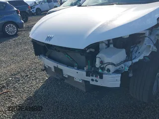 2024 Buick Envision Preferred with VIN LRBFZME45RD065420, listed as a IAAI auction lot 41884032 with 9,296 mi miles and . Bid and sale history available at DreamBid. Image 6.