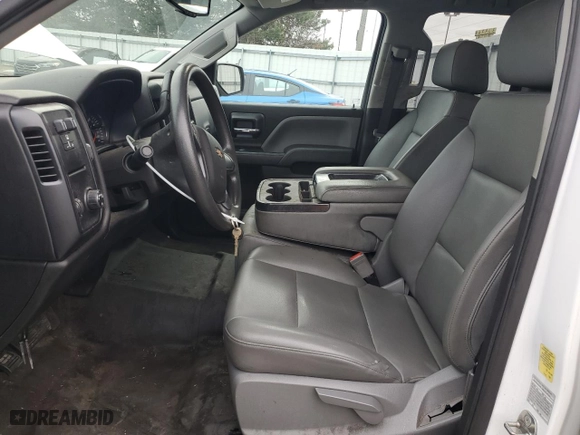 2019 Chevrolet Silverado 1500 LD Work Truck with VIN 2GCRCNEC7K1165291, listed as a Copart auction lot 84669394 with 135,828 mi miles and Clean Title. Bid and sale history available at carsss.com. Image 7.