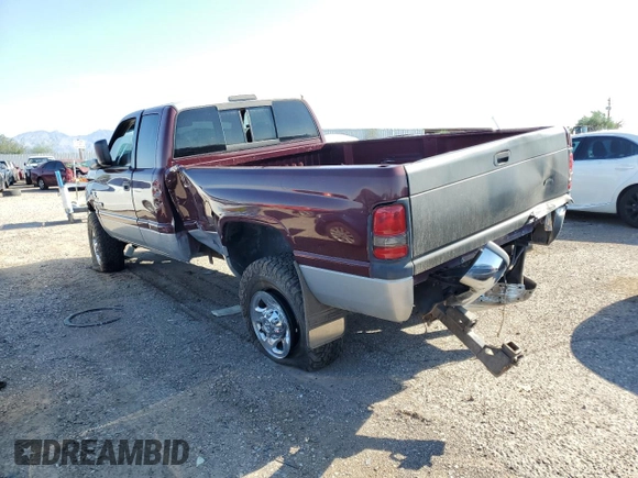 2001 Dodge Ram 2500 with VIN 1B7KF23661J228390, listed as a Copart auction lot 65231164 with 193,455 mi miles and Salvage Title. Bid and sale history available at carsss.com. Image 2.