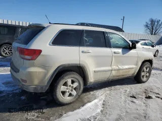 2012 Jeep Grand Cherokee Laredo with VIN 1C4RJFAG2CC267890, listed as a Copart auction lot 87832115 with 171,552 mi miles and Salvage Title. Bid and sale history available at carsss.com. Image 3.