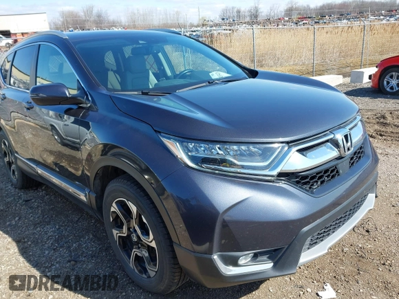 2018 Honda CR-V Touring with VIN 7FARW2H94JE044336, listed as a IAAI auction lot 41934128 with 70,861 mi miles. Bid and sale history available at carsss.com. Image 1.