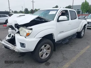 2015 Toyota Tacoma PreRunner with VIN 3TMKU4HN7FM043714, listed as a IAAI auction lot 42179707 with 151,092 mi miles and . Bid and sale history available at DreamBid. Image 2.