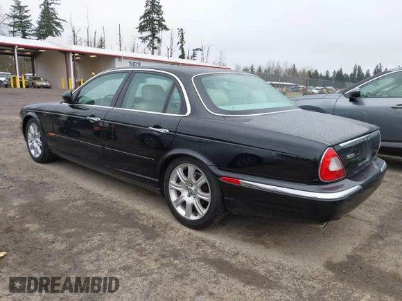 2004 Jaguar XJ with VIN SAJWA71C94SG29019, listed as a IAAI auction lot 41664978 with 133,546 mi miles. Bid and sale history available at carsss.com. Image 3.