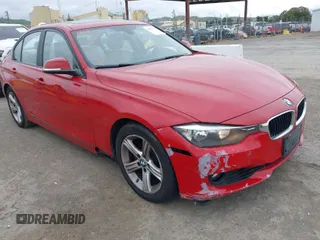 2013 BMW 3 Series 328i with VIN WBA3A5C51DF353779, listed as a IAAI auction lot 42036730 with 133,674 mi miles. Bid and sale history available at carsss.com. Image 1.