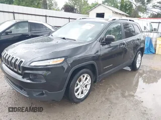 2016 Jeep Cherokee Latitude with VIN 1C4PJLCS4GW347185, listed as a IAAI auction lot 41909802 with 155,026 mi miles. Bid and sale history available at carsss.com. Image 2.