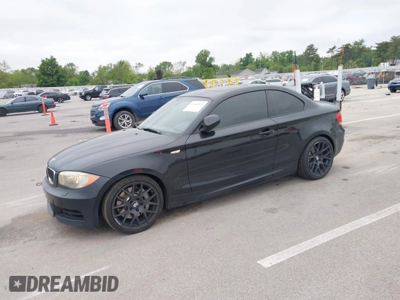 2012 BMW 1 Series 135i with VIN WBAUC9C5XCVM12693, listed as a IAAI auction lot 42341971 with 121,596 mi miles and . Bid and sale history available at DreamBid. Image 2.