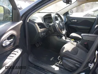 2015 Jeep Cherokee Latitude with VIN 1C4PJLCB9FW627909, listed as a IAAI auction lot 42034667 with 131,739 mi miles and . Bid and sale history available at carsss.com. Image 19.