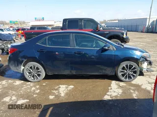 2017 Toyota Corolla L z VIN 5YFBURHE0HP721258, wystawiony jako IAAI lot #41706824 z przebiegiem 158 554 mil mil oraz . Historia ofert i sprzedaży dostępna na DreamBid. Obrazek 14.