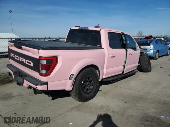 2023 Ford F-150 Raptor with VIN 1FTFW1RJ7PFA73609, listed as a Copart auction lot 45202695 with 22,974 mi miles and Salvage Title. Bid and sale history available at DreamBid. Image 3.