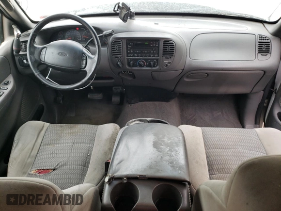 2002 Ford F-150 XL with VIN 1FTRX18L42NB60380, listed as a Copart auction lot 51806955 with 293,591 mi miles and Salvage title. Bid and sale history available at DreamBid. Image 8.