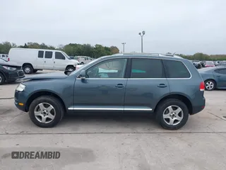 2007 Volkswagen Touareg V6 with VIN WVGZE77L97D011501, listed as a IAAI auction lot 41407720 with Not Provided miles and . Bid and sale history available at DreamBid. Image 14.