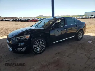 2014 Kia Cadenza Premium z VIN KNALN4D73E5133226, wystawiony jako Copart lot #53585025 z przebiegiem 107 942 mil mil oraz Szkody całkowita. Historia ofert i sprzedaży dostępna na DreamBid. Obrazek 1.