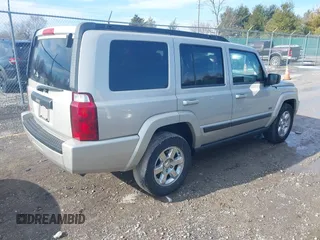 2007 Jeep Commander Sport z VIN 1J8HG48KX7C669647, wystawiony jako IAAI lot #41607617 z przebiegiem 333 861 mil mil oraz . Historia ofert i sprzedaży dostępna na DreamBid. Obrazek 4.