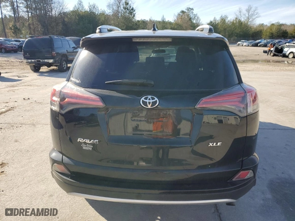 2016 Toyota RAV4 XLE with VIN 2T3WFREV3GW264823, listed as a Copart auction lot 88624835 with 148,142 mi miles and Salvage Title. Bid and sale history available at carsss.com. Image 6.