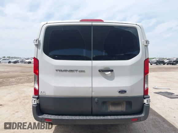 2018 Ford Transit with VIN 1FTYR1YM1JKA98581, listed as a IAAI auction lot 41941407 with 98,543 mi miles and . Bid and sale history available at carsss.com. Image 17.