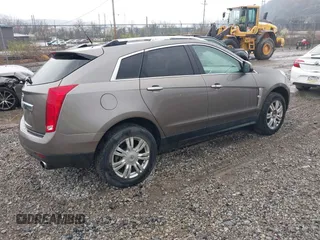 2011 Cadillac SRX Luxury Collection with VIN 3GYFNAEY9BS571833, listed as a IAAI auction lot 41983443 with 183,761 mi miles. Bid and sale history available at carsss.com. Image 4.