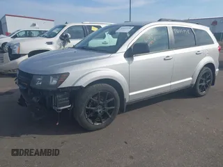 2013 Dodge Journey SXT with VIN 3C4PDDBG9DT680798, listed as a IAAI auction lot 41655958 with 140,594 mi miles and . Bid and sale history available at DreamBid. Image 2.
