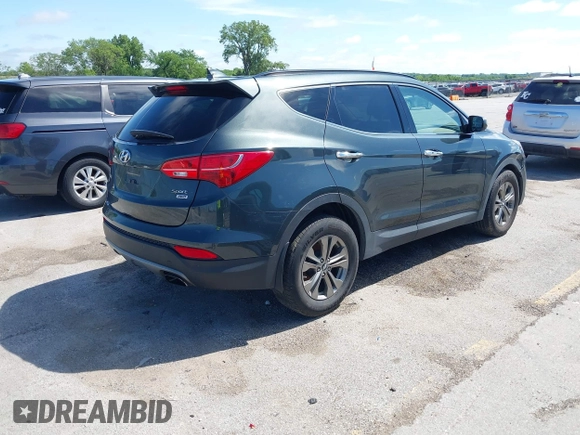 2014 Hyundai Santa Fe with VIN 5XYZUDLB0EG187984, listed as a IAAI auction lot 42607599 with 111,594 mi miles and . Bid and sale history available at DreamBid. Image 4.