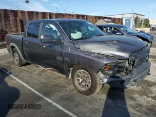2016 Ram 1500 Rebel z VIN 1C6RR7YT6GS211830, wystawiony jako Copart lot #54072485 z przebiegiem 56 512 mil mil oraz Szkody całkowita. Historia ofert i sprzedaży dostępna na DreamBid. Obrazek 4.