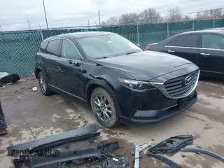 2016 Mazda CX-9 Touring with VIN JM3TCBCY3G0115632, listed as a IAAI auction lot 41732439 with 150,725 mi miles. Bid and sale history available at carsss.com. Image 1.