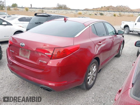 2013 Kia Optima EX z VIN 5XXGN4A74DG110086, wystawiony jako IAAI lot #40963304 z przebiegiem 137 377 mil mil oraz . Historia ofert i sprzedaży dostępna na DreamBid. Obrazek 4.