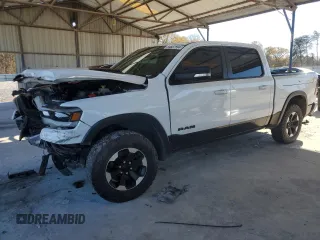 2021 Ram 1500 Rebel z VIN 1C6SRFLT2MN529005, wystawiony jako Copart lot #84687594 z przebiegiem 167 992 mil mil oraz Nie do naprawy • Non repairable. Historia ofert i sprzedaży dostępna na DreamBid. Obrazek 1.