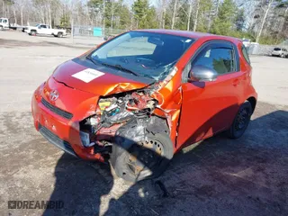 2012 Scion iQ with VIN JTNJJXB08CJ020482, listed as a IAAI auction lot 41834604 with 1 mi miles. Bid and sale history available at carsss.com. Image 2.