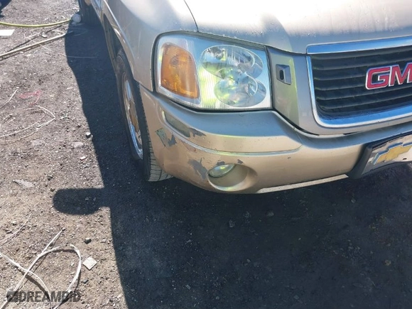 2004 GMC Envoy SLE with VIN 1GKDS13S442179334, listed as a IAAI auction lot 41693042 with 224,868 mi miles. Bid and sale history available at carsss.com. Image 6.
