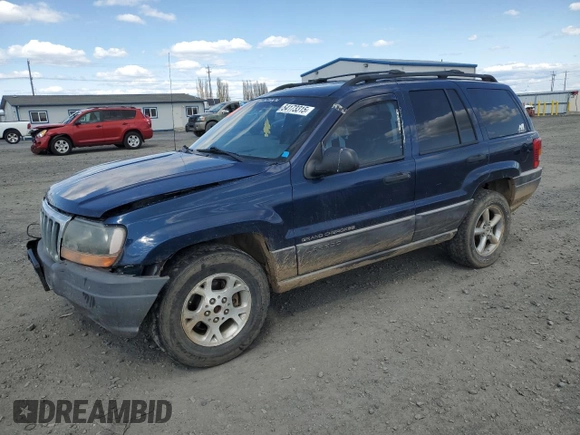 2000 Jeep Grand Cherokee Laredo z VIN 1J4GW48S2YC154627, wystawiony jako Copart lot #54173315 z przebiegiem 251 666 mil mil oraz Szkoda całkowita • Salvage title. Historia ofert i sprzedaży dostępna na DreamBid. Obrazek 1.