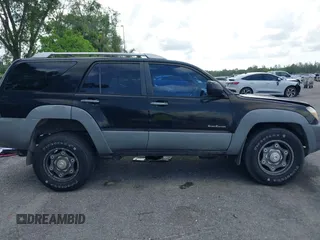 2003 Toyota 4Runner SR5 z VIN JTEZU14RX30007340, wystawiony jako IAAI lot #42361002 z przebiegiem 168 457 mil mil oraz . Historia ofert i sprzedaży dostępna na DreamBid. Obrazek 13.