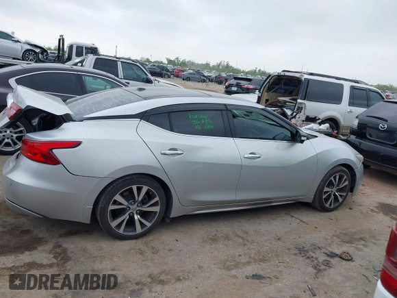 2016 Nissan Maxima SL with VIN 1N4AA6AP2GC386239, listed as a IAAI auction lot 41871290 with 175,941 mi miles and . Bid and sale history available at DreamBid. Image 13.
