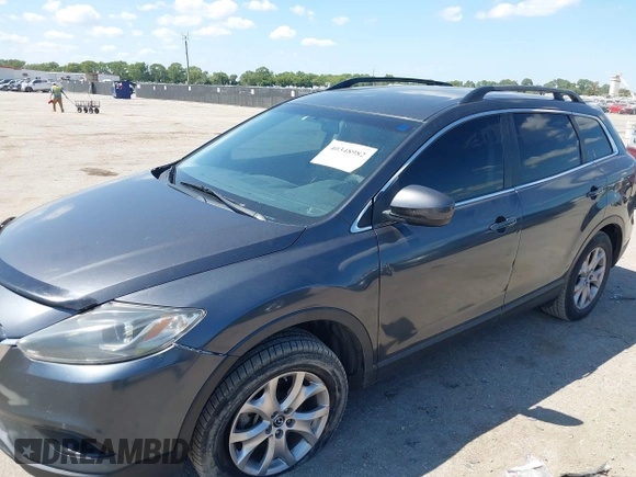 2015 Mazda CX-9 Sport with VIN JM3TB2BA7F0465965, listed as a IAAI auction lot 40348982 with 165,284 mi miles and . Bid and sale history available at carsss.com. Image 6.