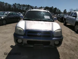 2005 Hyundai Santa Fe GLS with VIN KM8SC73E25U884390, listed as a IAAI auction lot 41824089 with 127,570 mi miles. Bid and sale history available at carsss.com. Image 6.