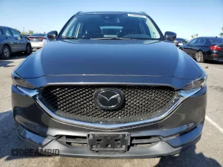 2019 Mazda CX-5 Grand Touring with VIN JM3KFADM2K0665356, listed as a Copart auction lot 51886685 with 44,760 mi miles and Salvage Title. Bid and sale history available at carsss.com. Image 5.