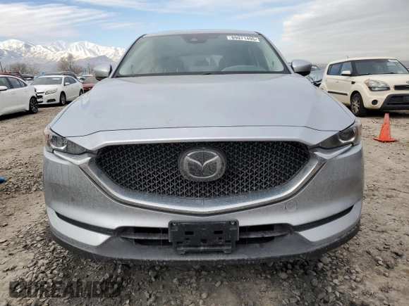 2021 Mazda CX-5 Touring with VIN JM3KFACM9M0409414, listed as a Copart auction lot 89071495 with 43,896 mi miles and Salvage Title. Bid and sale history available at carsss.com. Image 5.
