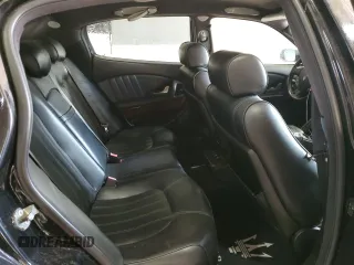2005 Maserati Quattroporte z VIN ZAMCE39A050015127, wystawiony jako Copart lot #85957714 z przebiegiem 88 278 mil mil oraz Czysty tytuł • Clean title. Historia ofert i sprzedaży dostępna na DreamBid. Obrazek 10.