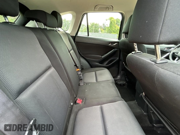 2013 Mazda CX-5 Sport with VIN JM3KE4BE7D0141588, listed as a Copart auction lot 66138585 with 124,920 mi miles and Clean title. Bid and sale history available at DreamBid. Image 6.